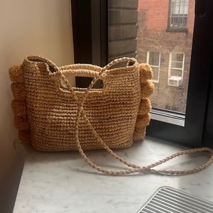 Straw Pom Pom bag by “hat attack”